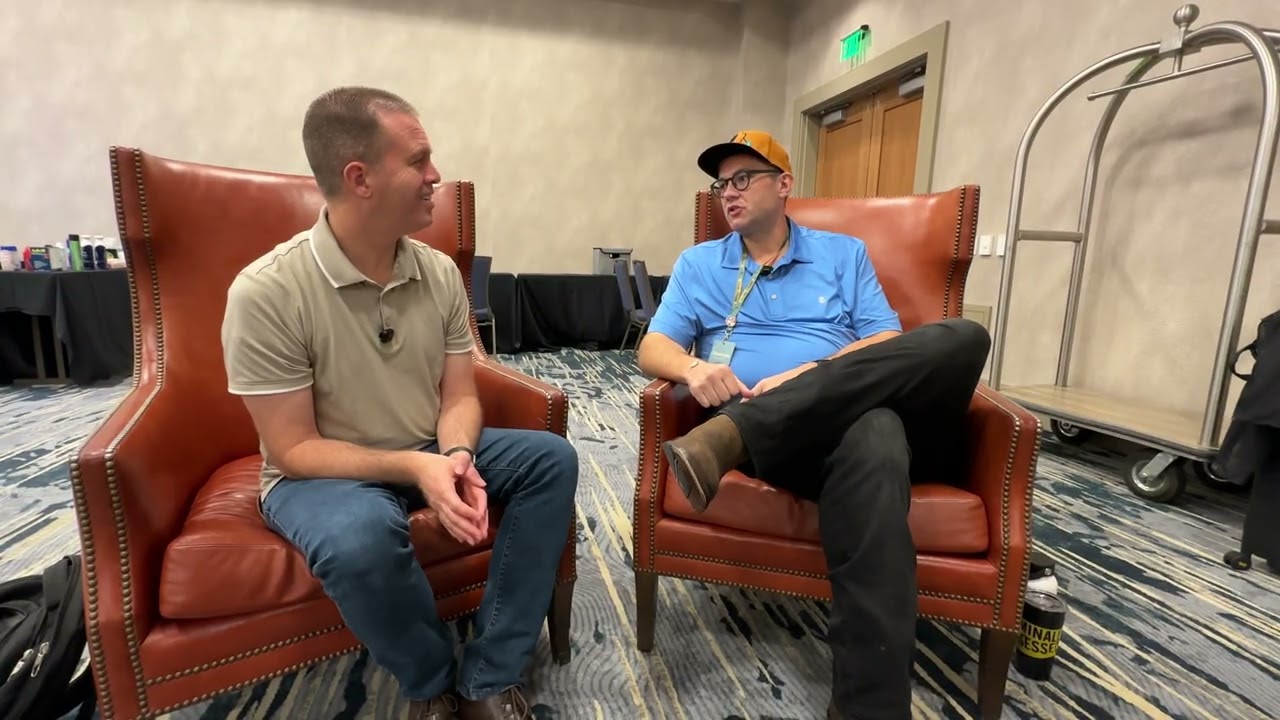 Shane Watters, host of 'Foul Play' podcast, talks with Nate Eaton at CrimeCon 2025