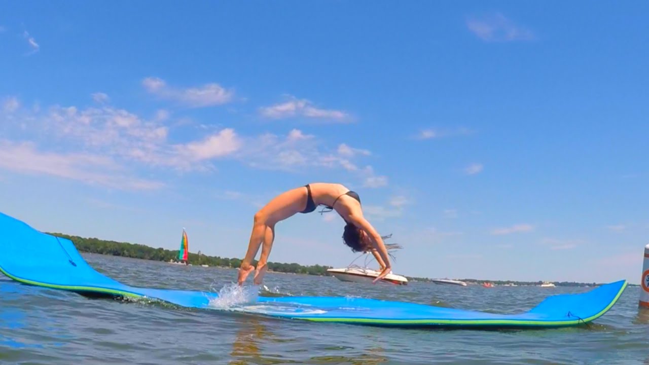 TRYING GYMNASTICS ON A WATER MAT | TheCheernastics2