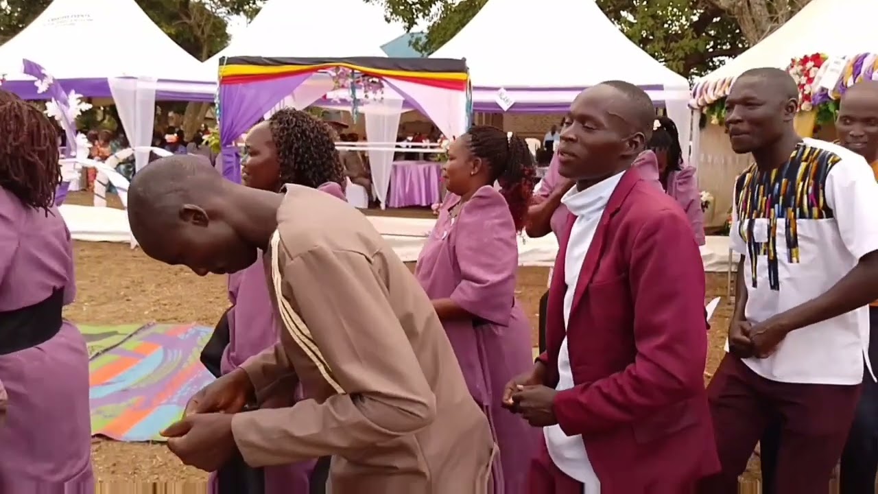 Nyom pa prs. Joice Laker gin  ki Apostel Dr julius peter Oyet