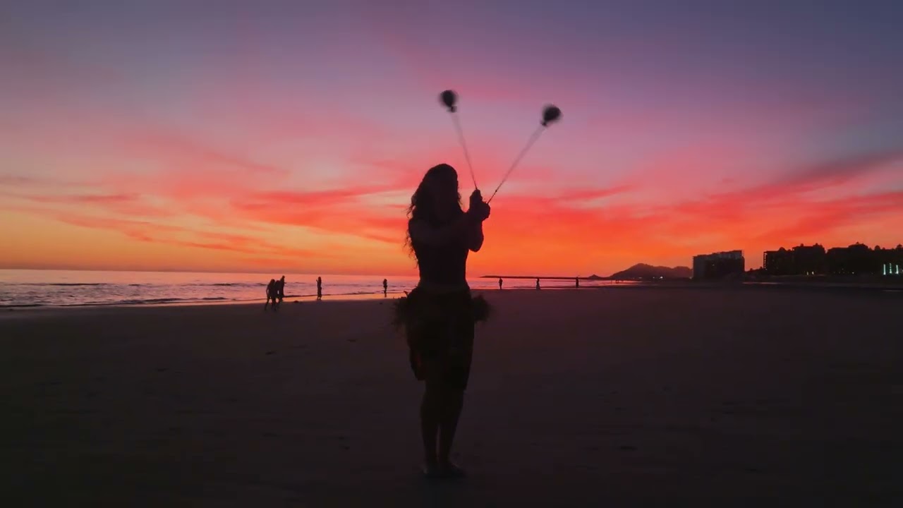 Selena Dutton Otea and Long Poi on Beach