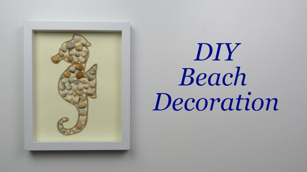 Seashell decorations. Seahorse with seashells in the frame. DIY Beach Decorations