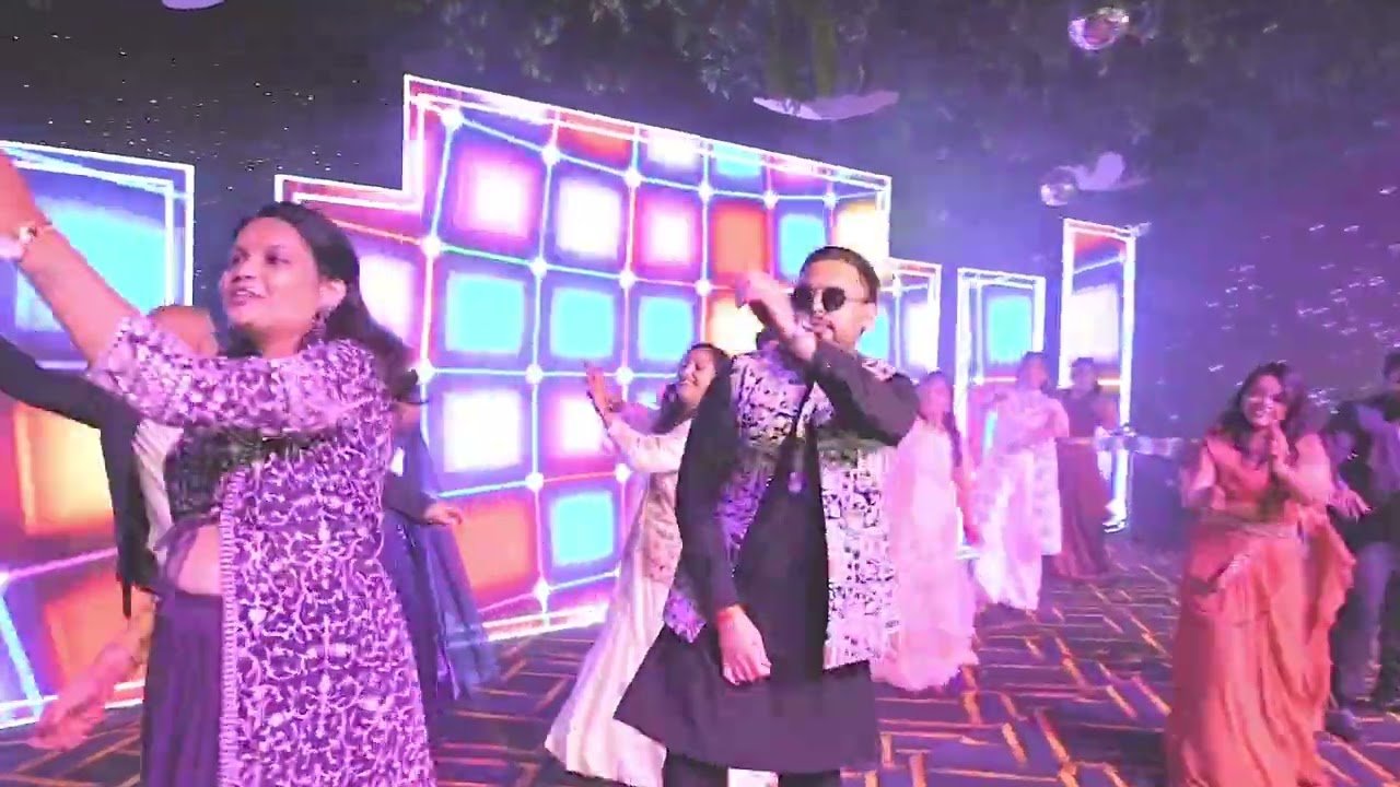 Bride's sisters and brothers dance