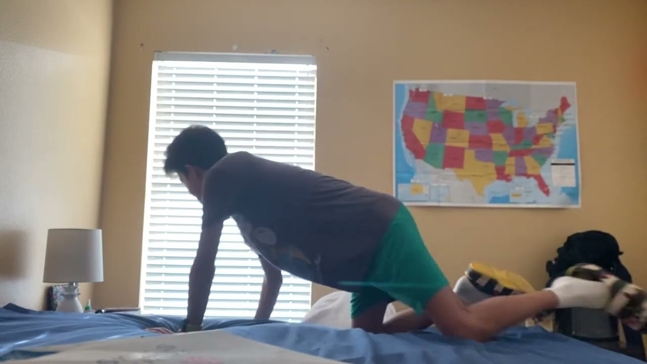 Making my bed. (MY QUEEN SIZED BED!)