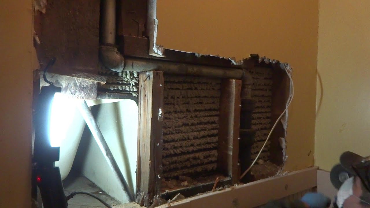 WATER LEAK IN WALL WHEN SINK DRAIN BACKS UP