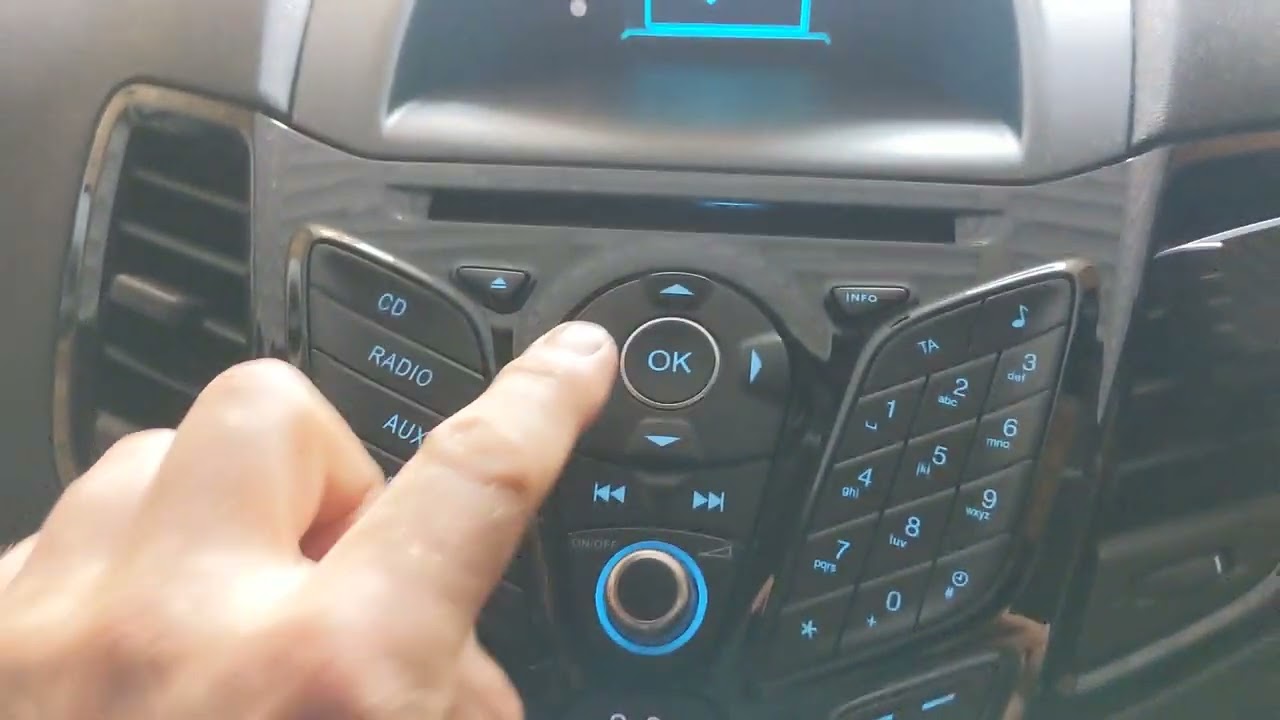 How to change the clock on a 2015 Ford Fiesta