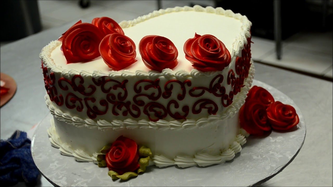 Decorating a Heart Shaped Cake with Red Roses