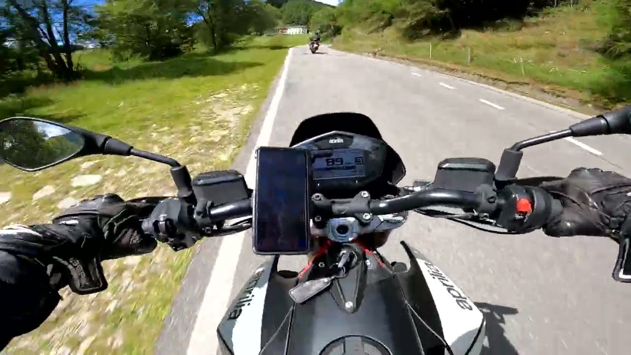 Riding the Mortirolo mountain pass on an Aprilia Dorsoduro 900