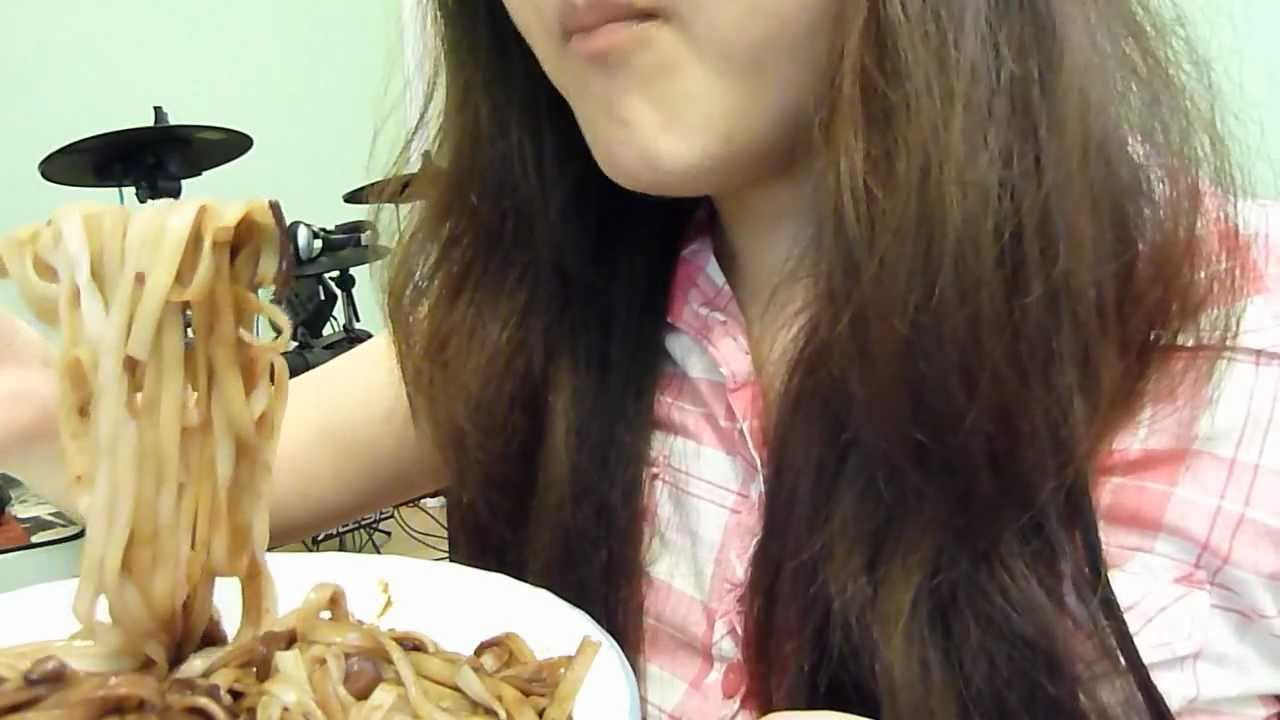 Eating Noodles with Black Bean Sauce (짜장면)