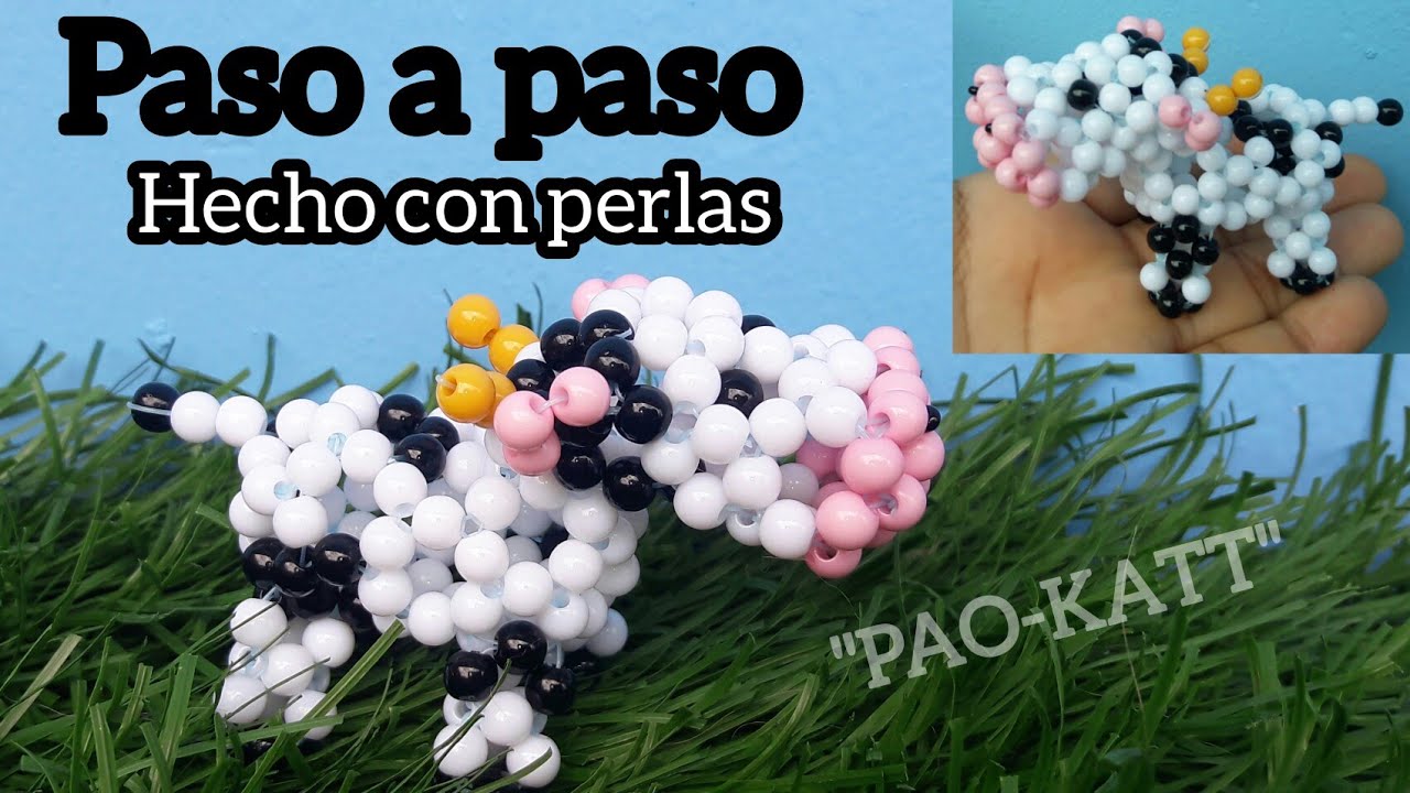 Vaca tejida con perlas o cuentas
