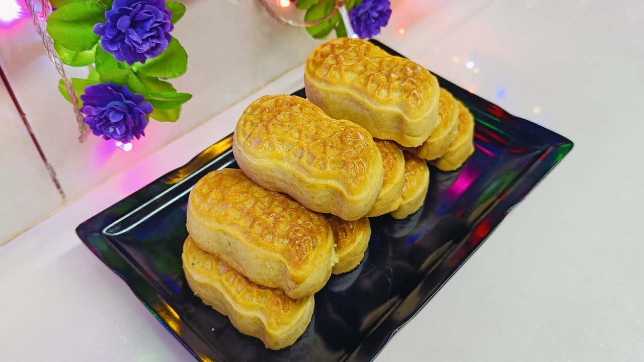 花生芝麻月饼！！超级的好吃！！不用碱水 不用转化糖浆！！更不需要回油 做好可以直接吃了喔！制作非常的简单！！