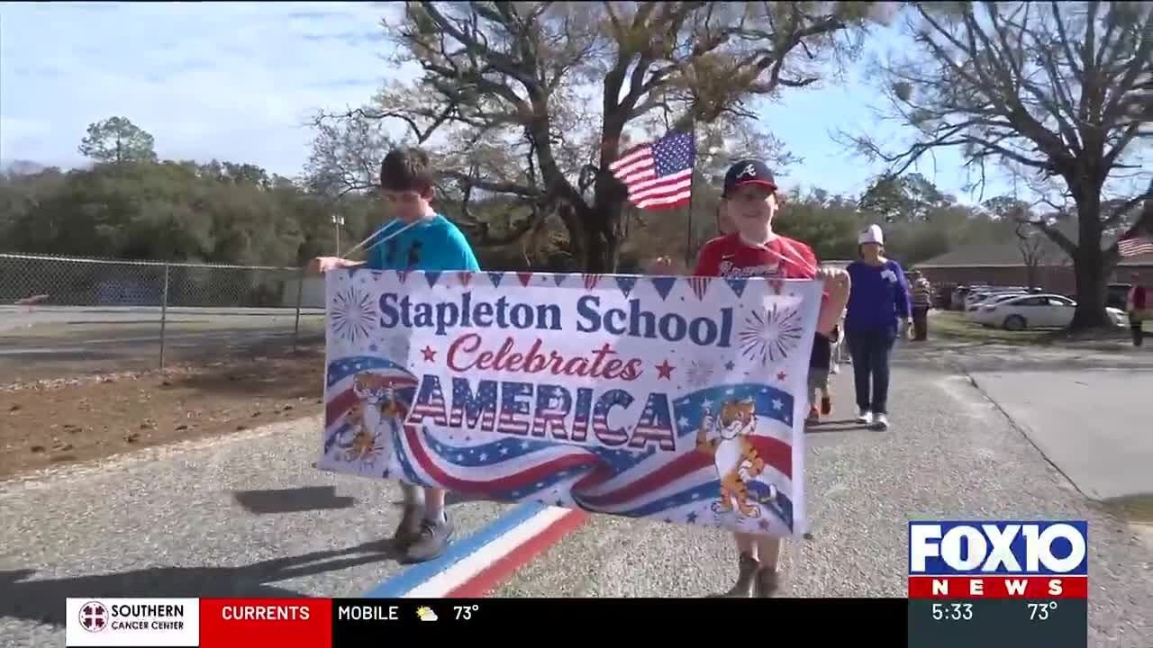 Stapleton School marks America’s 250th birthday with patriotic walk, student-funded stripe repain...