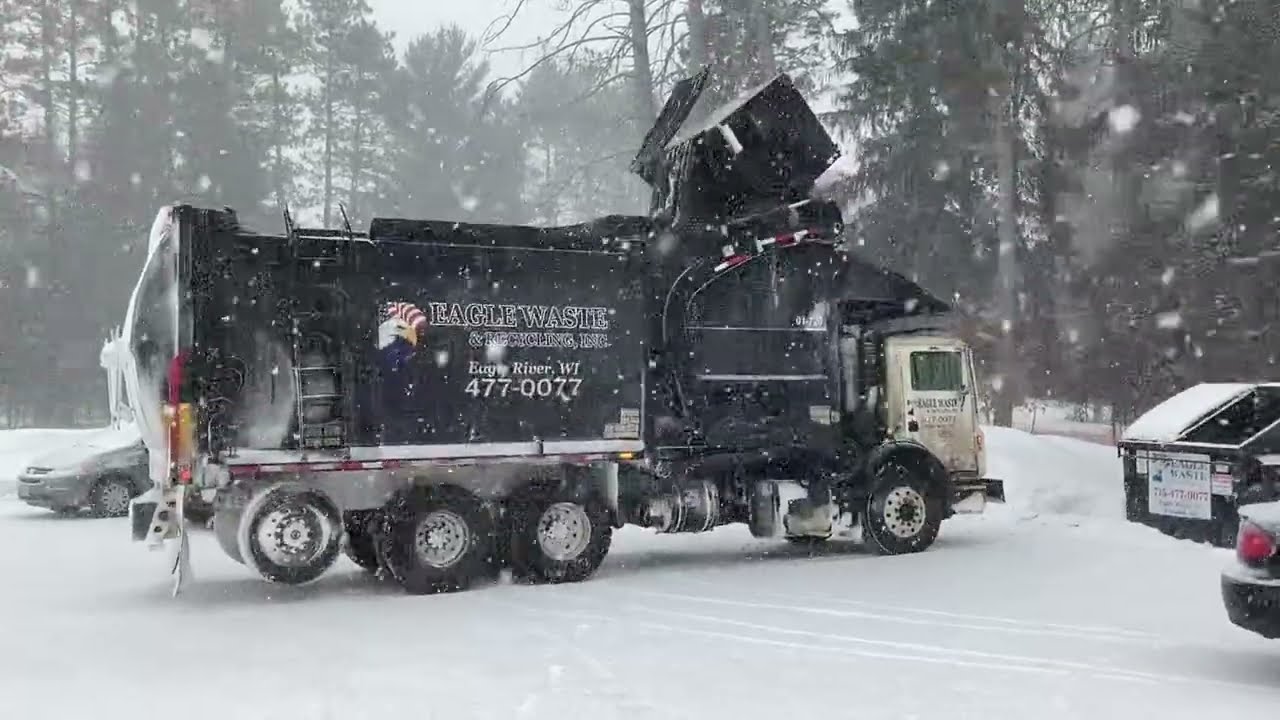 Eagle Waste and Recycling Garbage Truck In A Blizzard