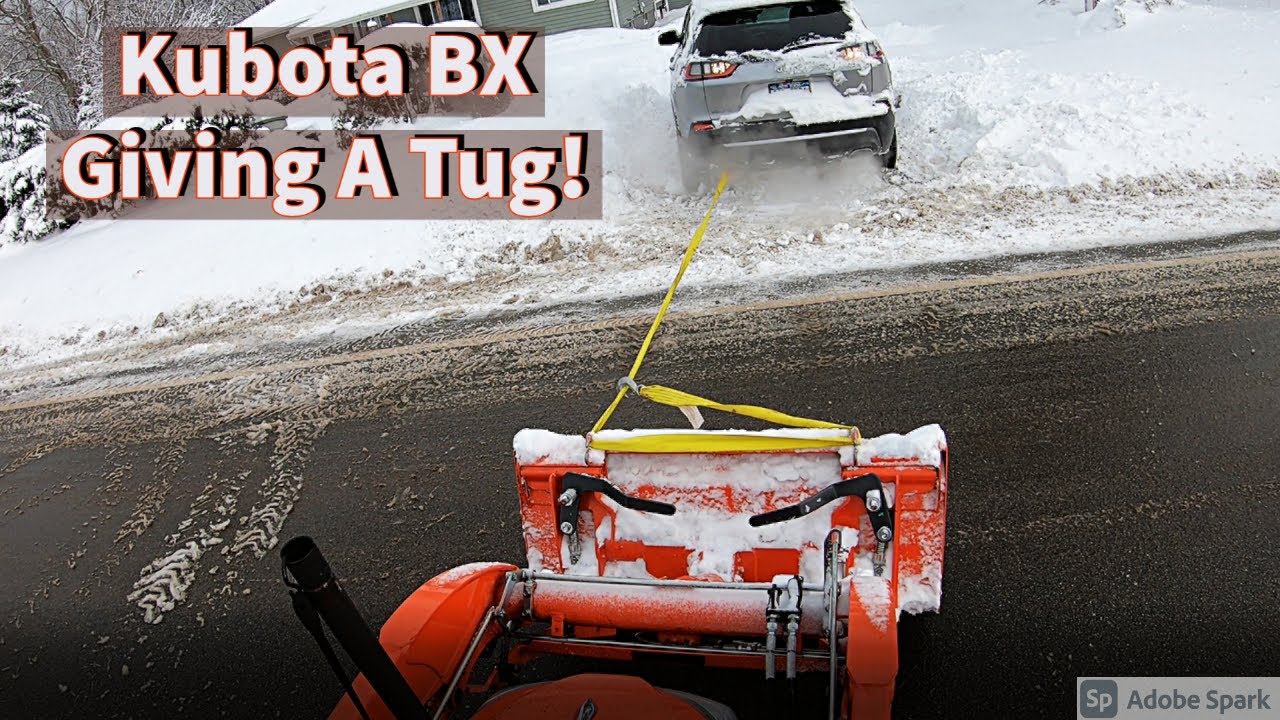 Kubota BX- Rescuing the neighbors!! (Pulling Out Stuck Vehicles + Plowing 3 Feet Of Snow!)