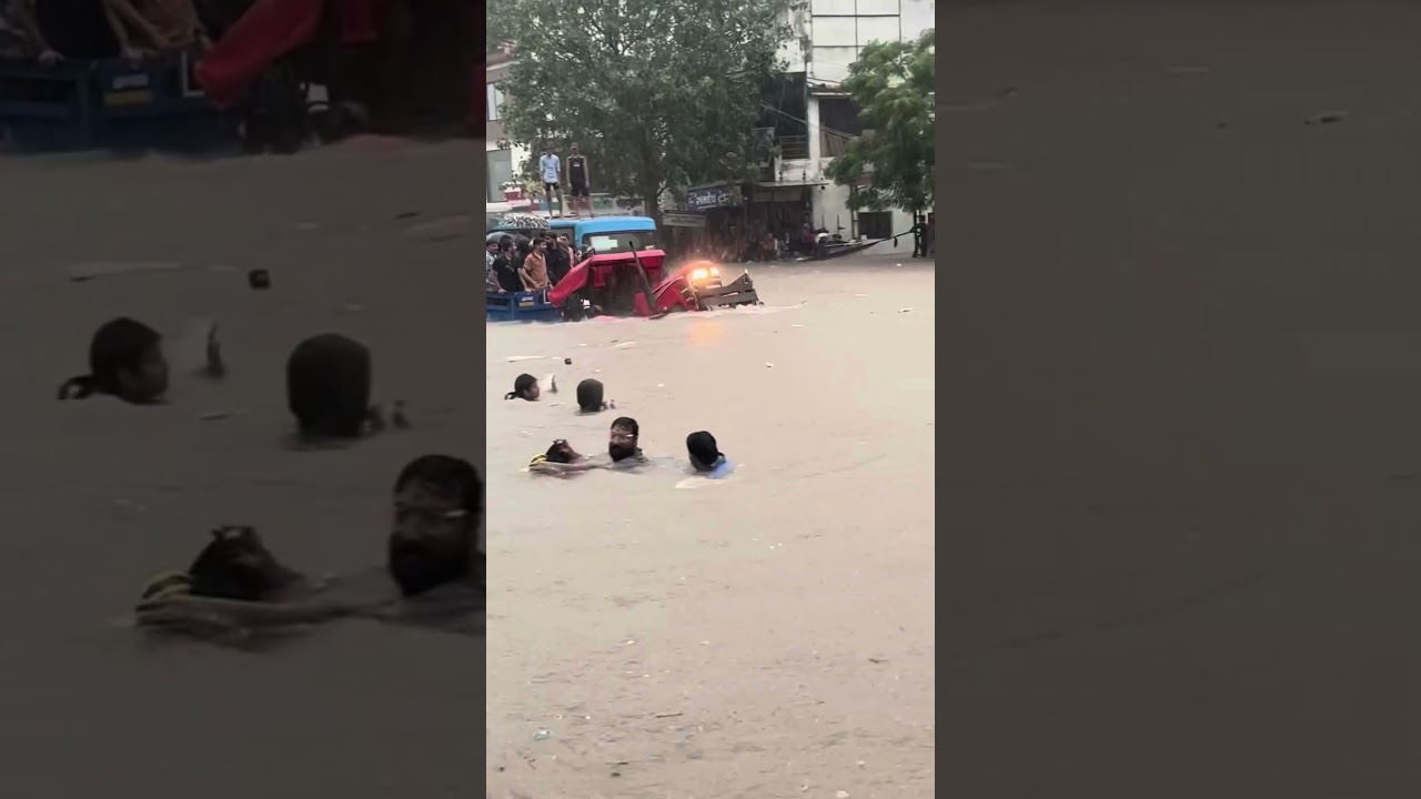 Tractor Passing Through Floodwater in Surat in extra ordinary manner