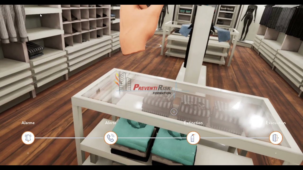 Formation incendie en r&eacute;alit&eacute; virtuelle dans un magasin textile - manipulation des extincteurs r&eacute;els