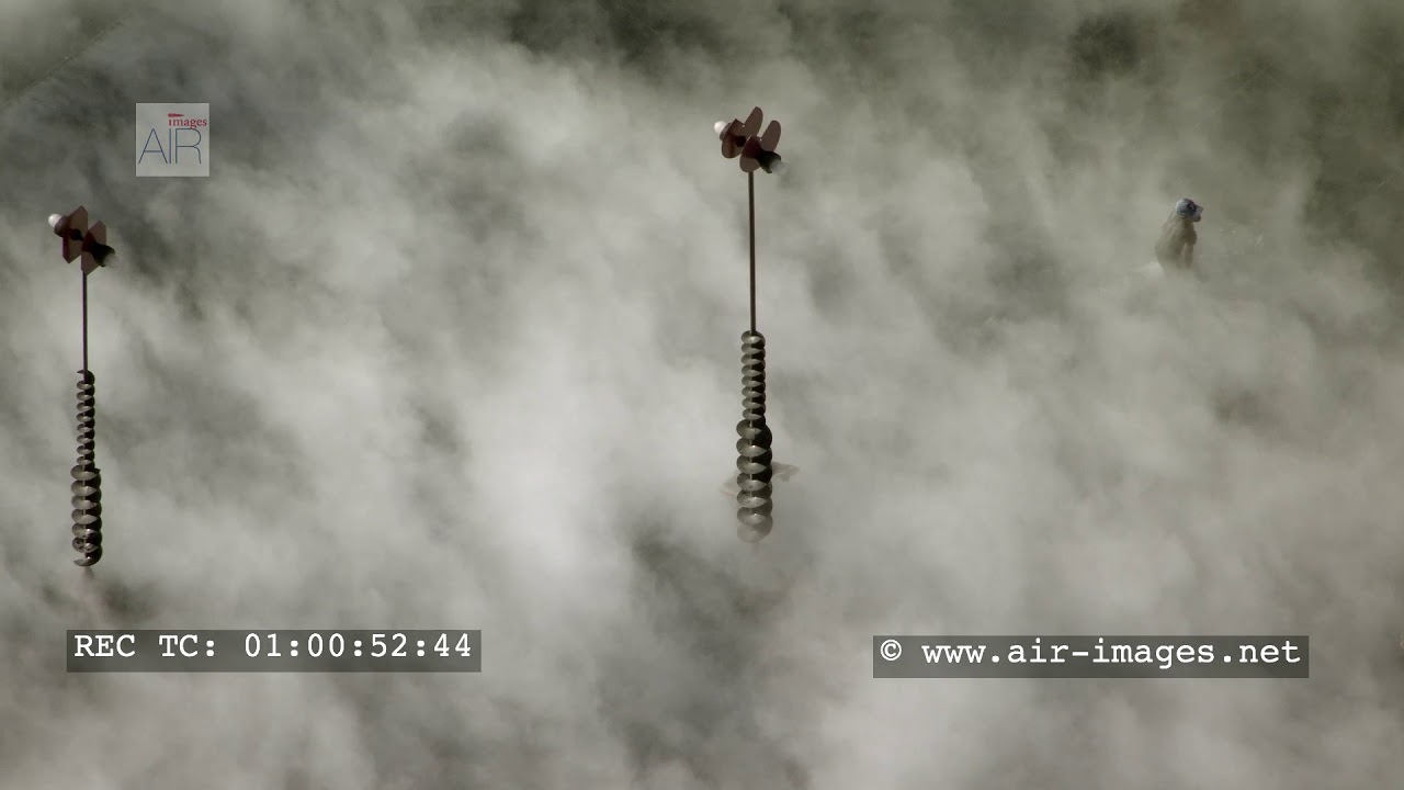 District of Paris La Défense/ Fog sculpture by the japanese artist Fujiko Nakaya  in the basin Takis
