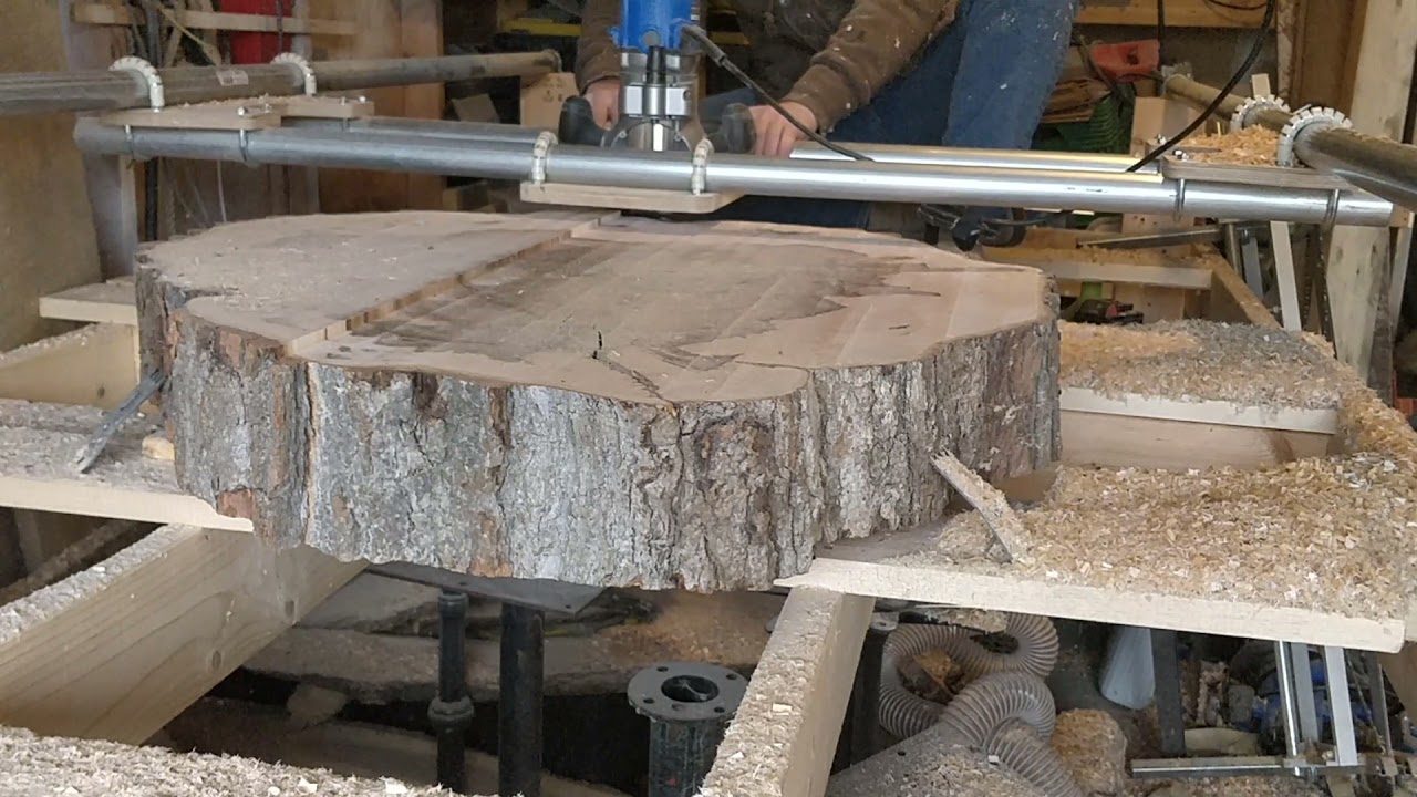 flattening huge maple cookie with sled router table