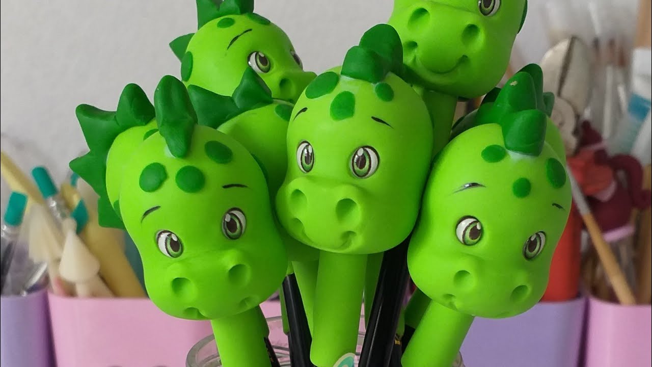 Ponteira de lápis em biscuit Dinossauro