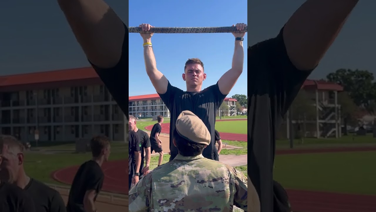 Army Ranger evaluates Special Operations recruits in max pull-ups during the Hell Day Tampa Event