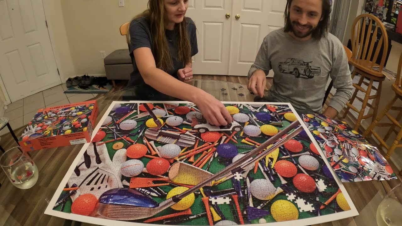 Golf puzzle a Caddy's Mess Puzzle Piece Challenge who can finish the puzzle faster with 20 pieces.
