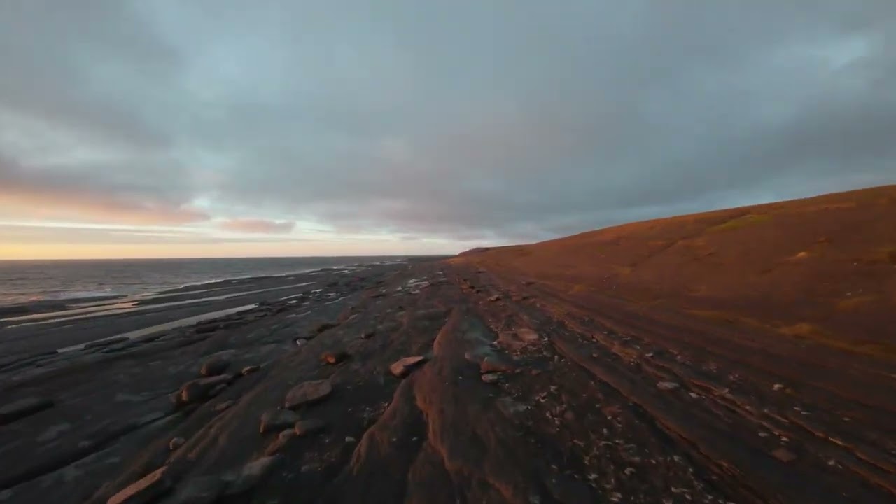 Flying Around Point Riche At Sunset, Port au Choix Newfoundland