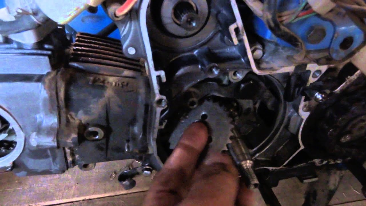 como cambiar cadena de distribución en motos 110 cc y 70 cc parte 2