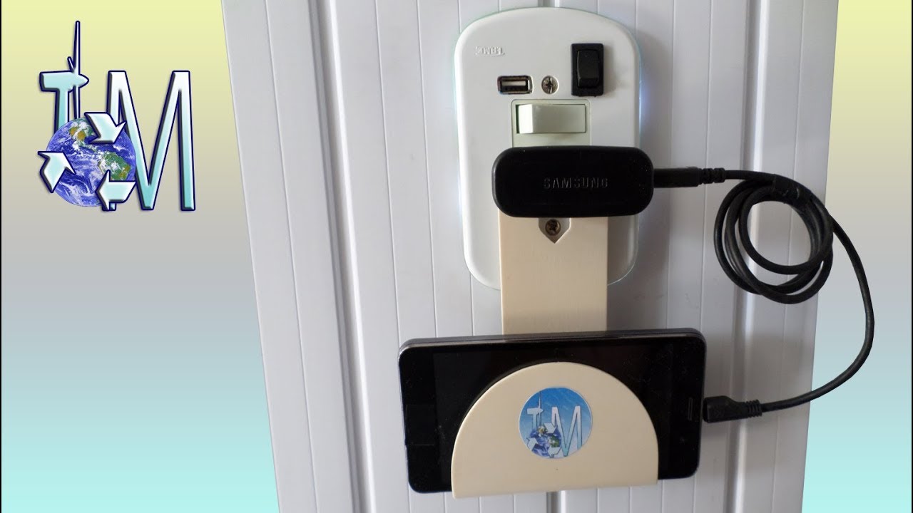 Suporte para carregar celular na tomada