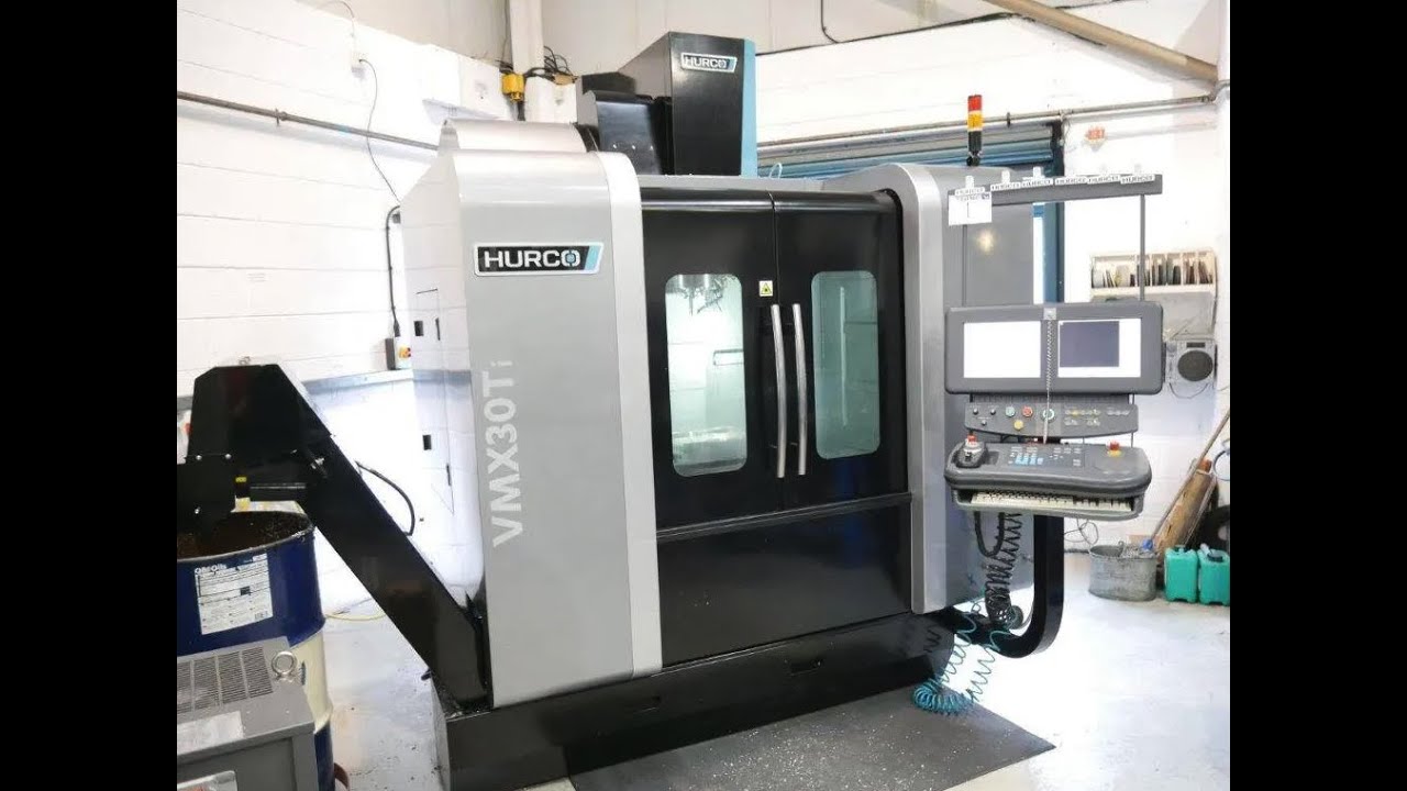 A running HURCO VMX 30TI 3 AXIS CNC VERTICAL MACHINING CENTRE