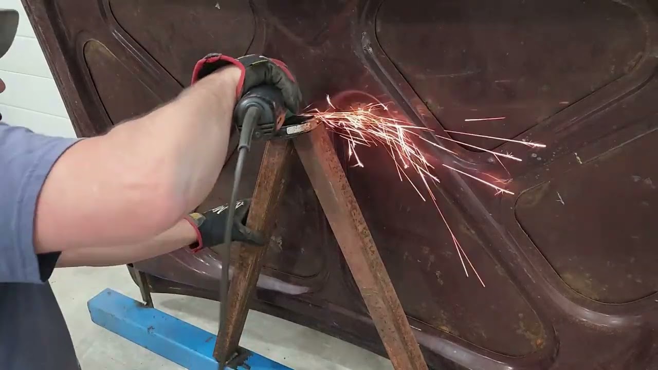 Stretching a trunk lid.