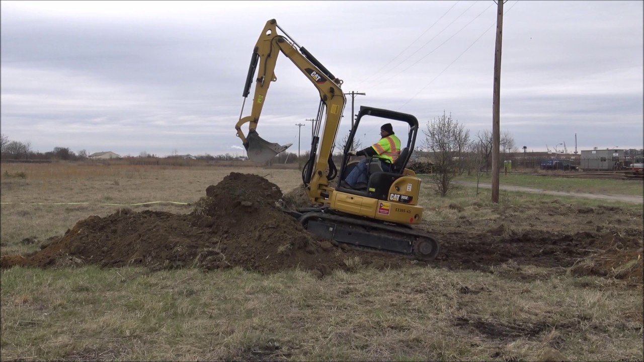 Moving Dirt with Cat 305E Mini-Excavator and Case 450 Tracked Loader