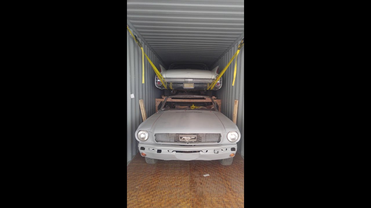 Loading classic cars and parts in container
