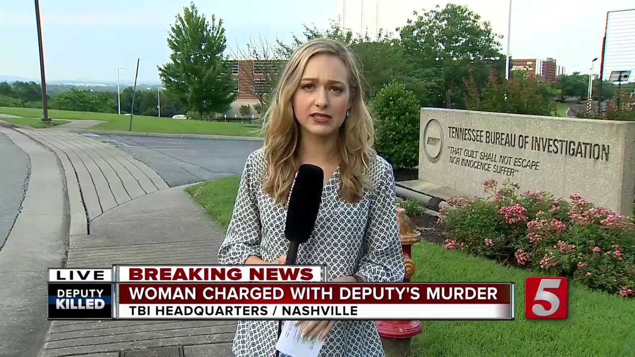 Woman Charged With Deputy's Murder