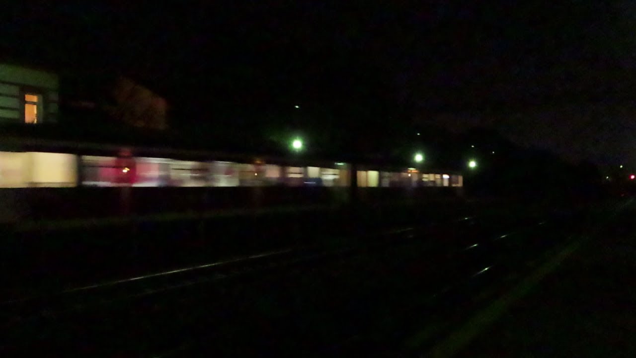 Romania: A Transferoviar Calatori multiple unit passes Chitila on a northbound passenger train