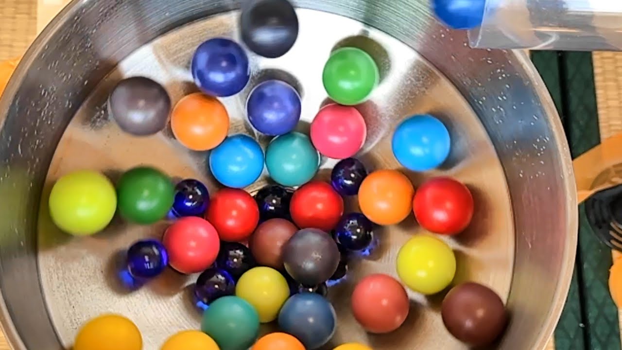Make a marble run course using transparent long pipes, funnels, and rain gutters. #ASMR