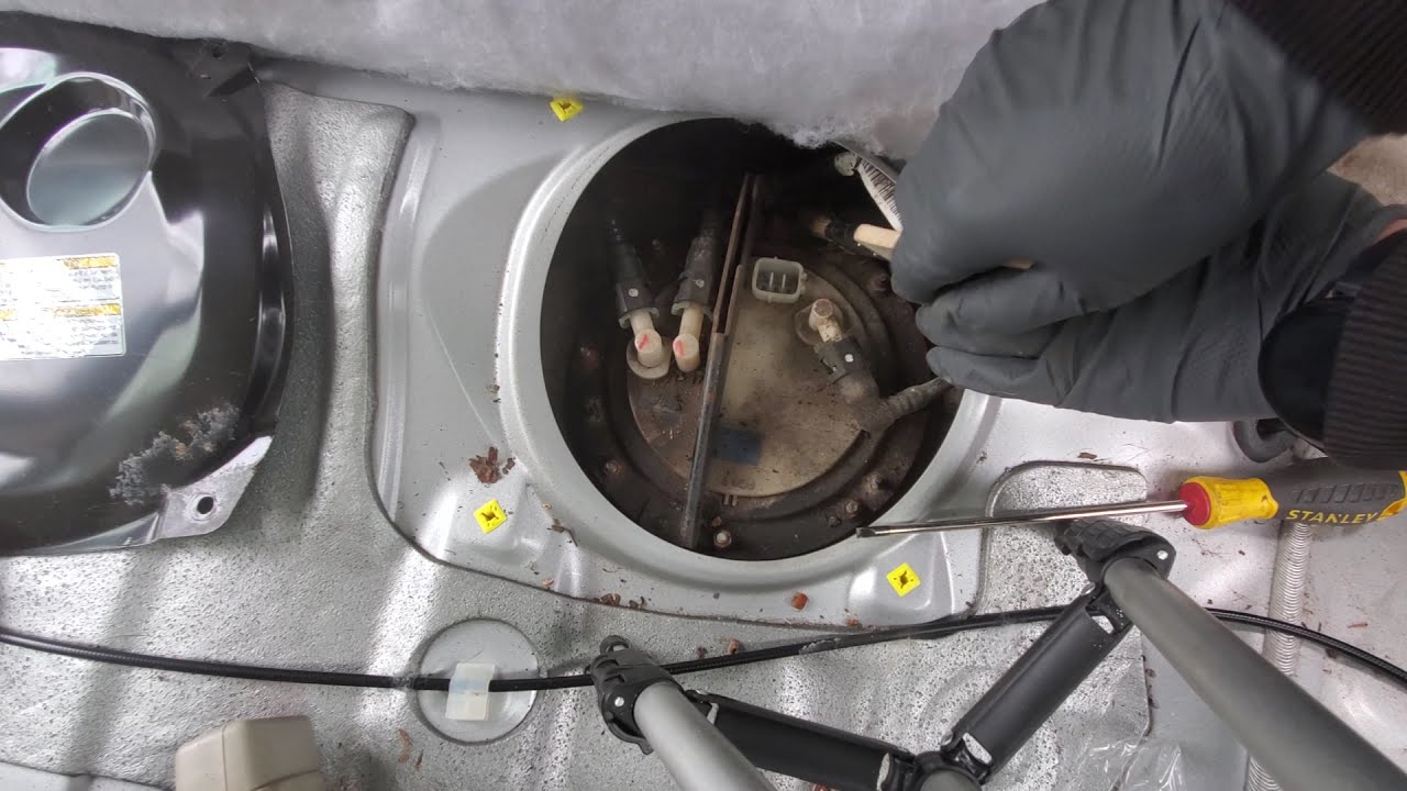 Subaru outback fuel pump location and removal