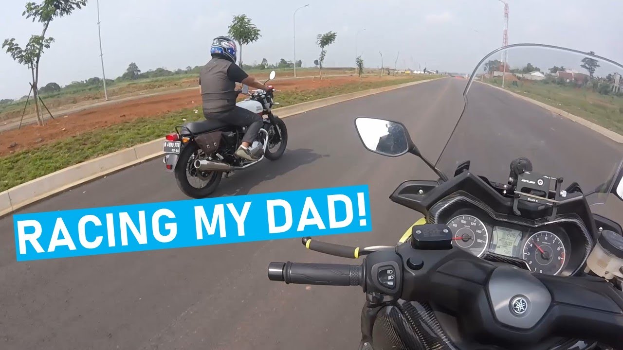 Motorbike riding around Jakarta City with Dad