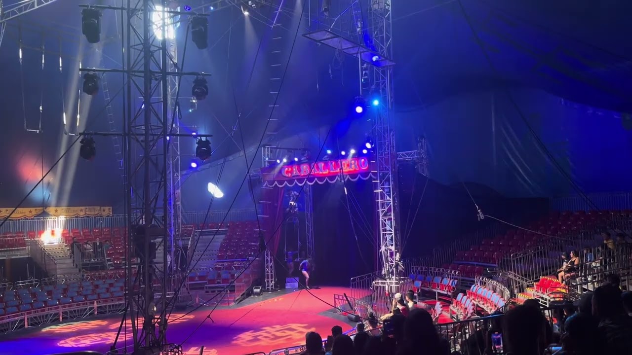 Circus Caballero Motorcycle & lady dance around 