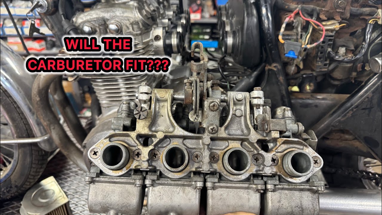 Installing Carburetor in a 1973 Honda CB350.