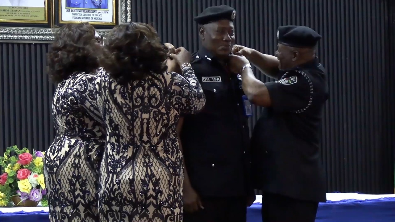 Moment Senior Police officer was decorated by His two Wives alongside IGP Disu