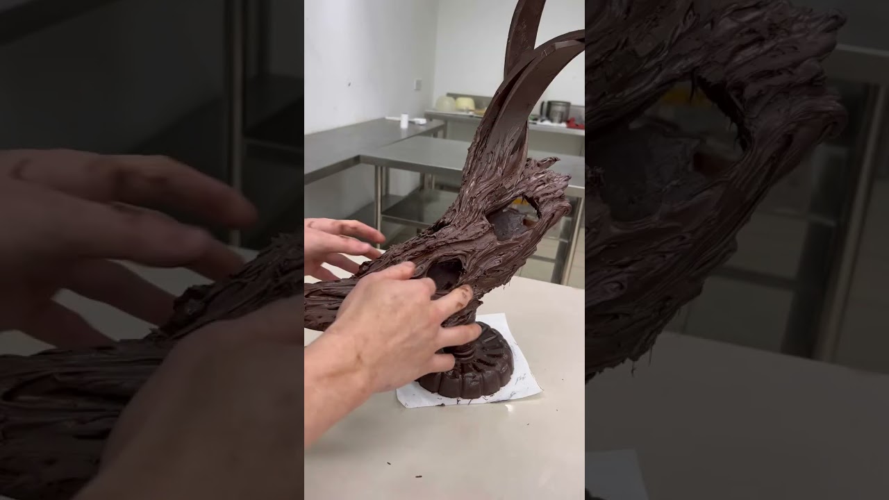 What miracles can a bottle do? Amazing chocolate showpiece from the world champion. #chocolate