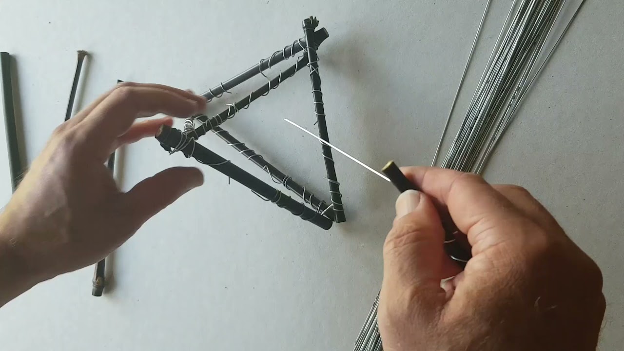 Art demo. How to construct a sculptural form from sticks and wire