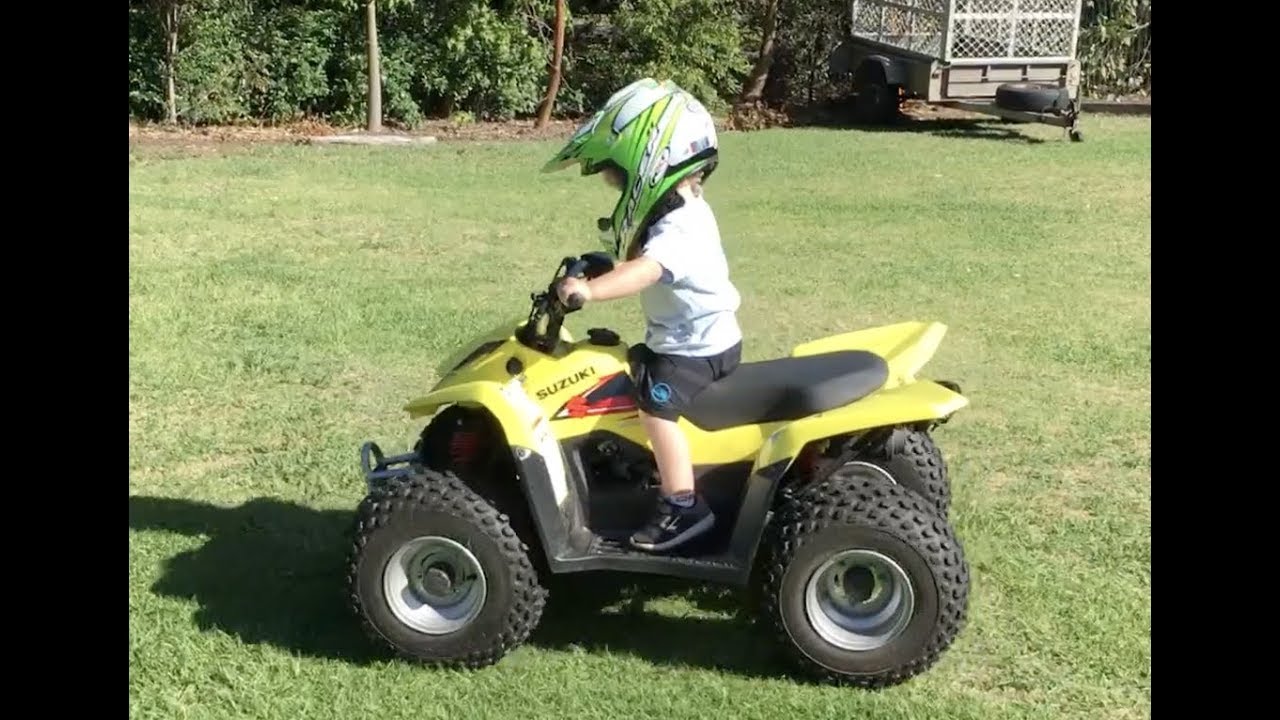 1 Year Old boy riding suzuki quad Bike by him self - SHOCKING