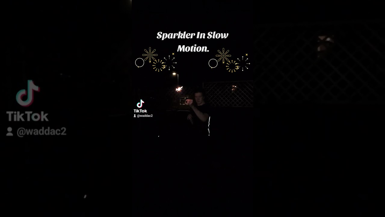 Bonfire Night Sparkler In Slow Motion While My Son Waves It In The Dark