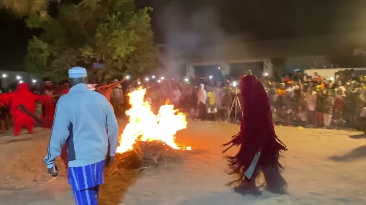 Masquerade in Kartong, dance in fire