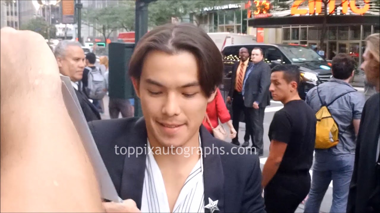 Ryan Potter signs autographs for TopPix