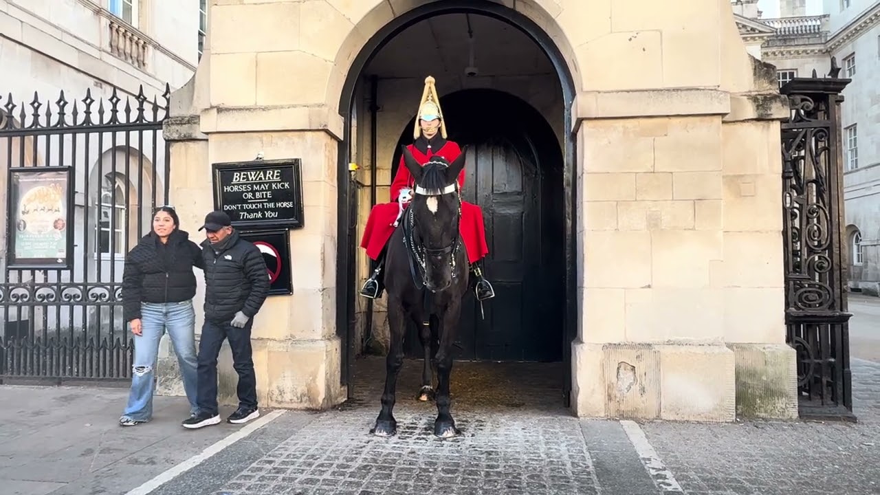 Tourist happy no take a picture with the king’s Guard