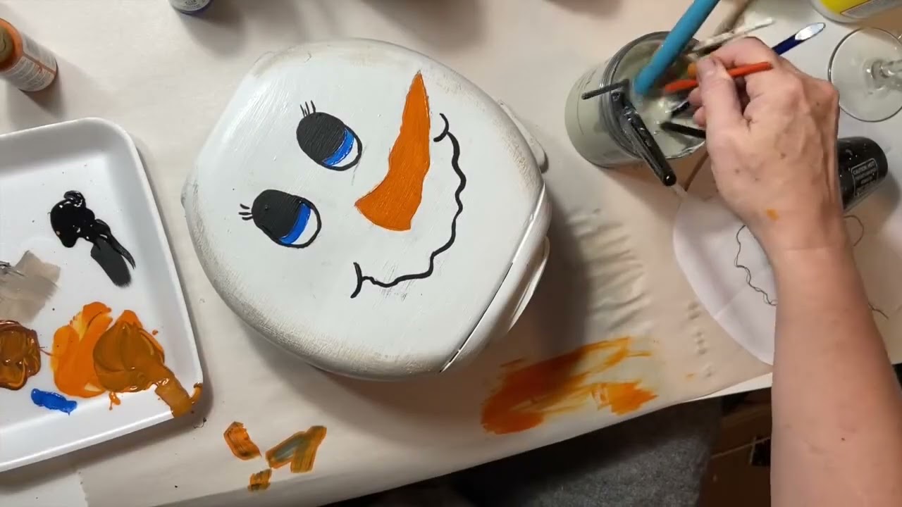Snowman Tree Topper made from a Gain Detergent Pod Container
