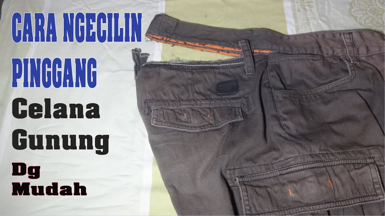 cara mengecilkan pinggang celana gunung yang kebesaran