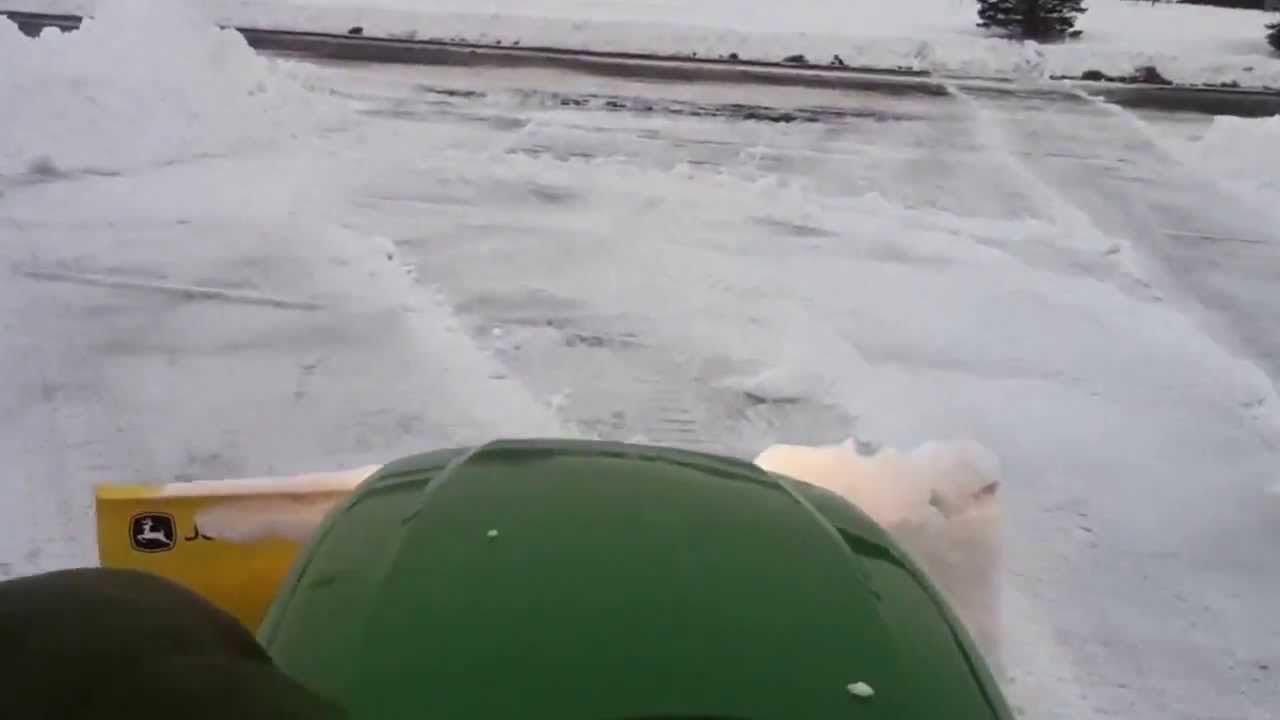 Plowing snow with John Deere x485