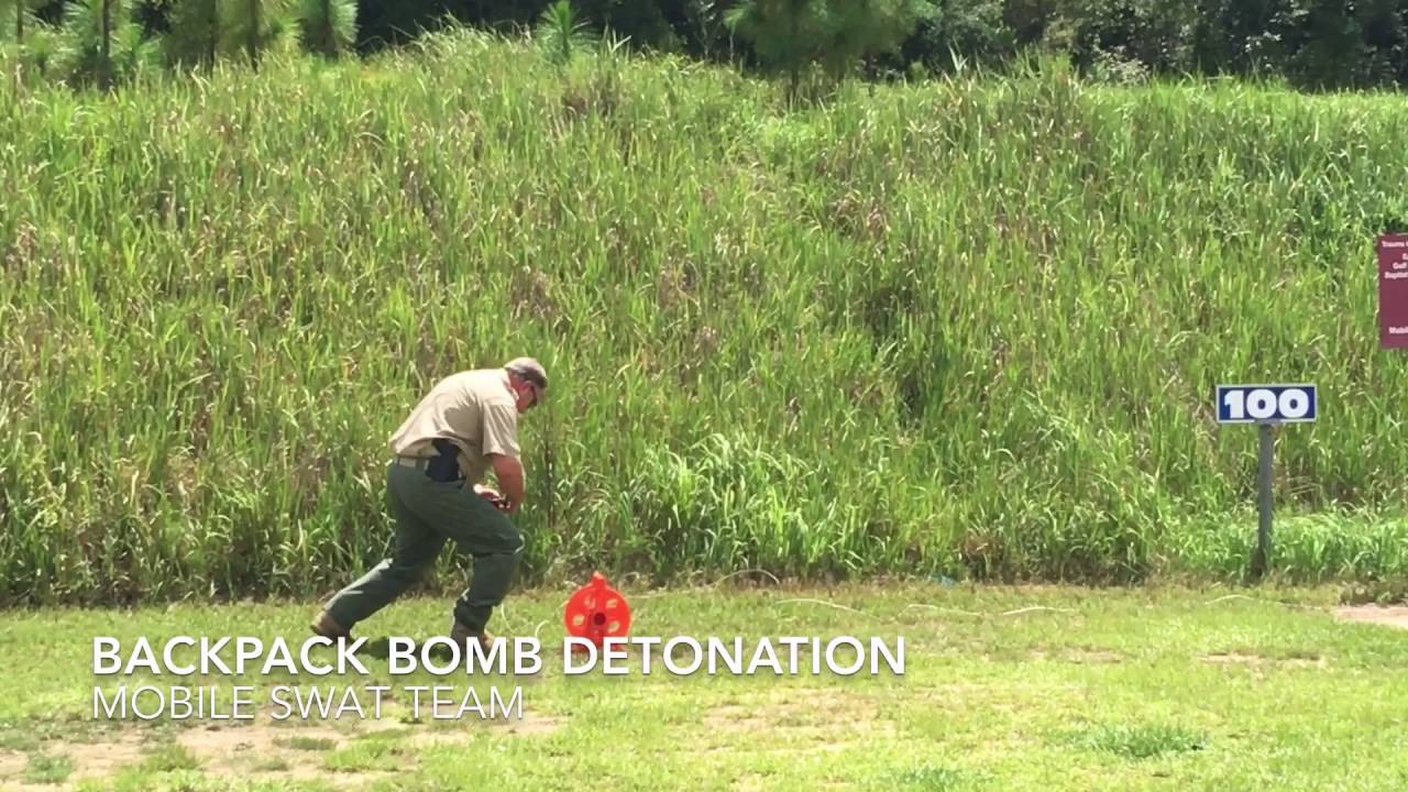 Mobile SWAT team demos high-powered rifles and explosives for media